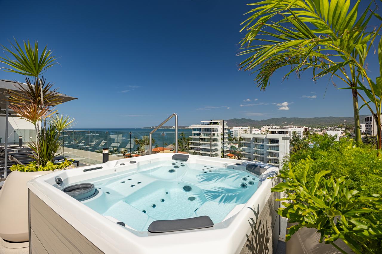 Rooftop jacuzzi with sweeping Banderas Bay and Sierra Madre views