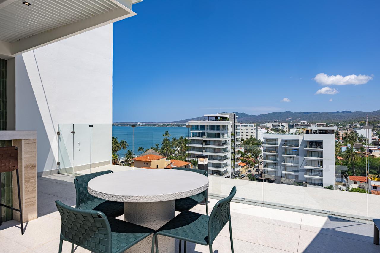 Private terrace with round table and Banderas Bay view