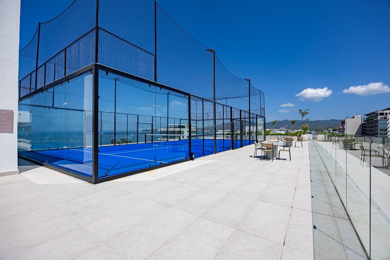 Pickleball terrace with cafe seating overlooking Banderas Bay